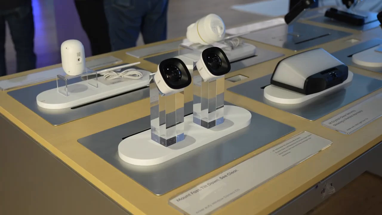 Three eufy Window Camera E10 units arranged on a showcase table.