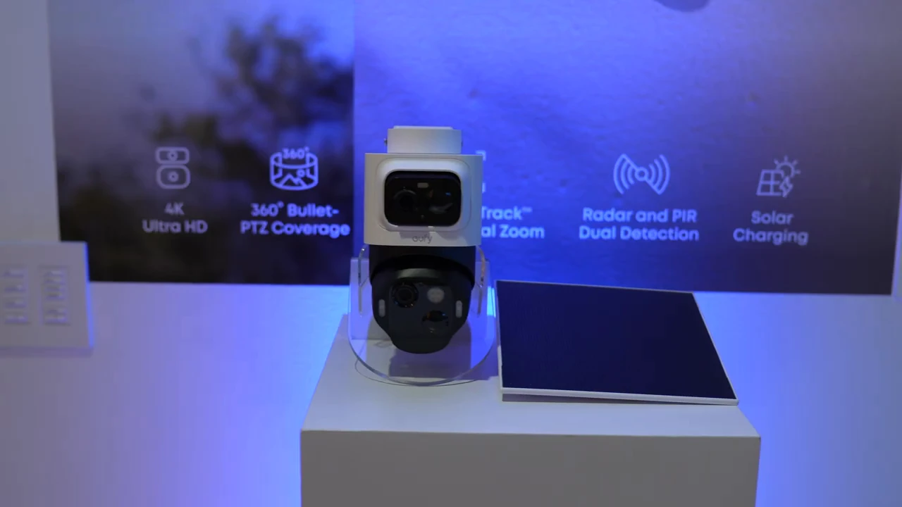 eufyCam E52 on a showcase display with its upper and lower cameras visible.