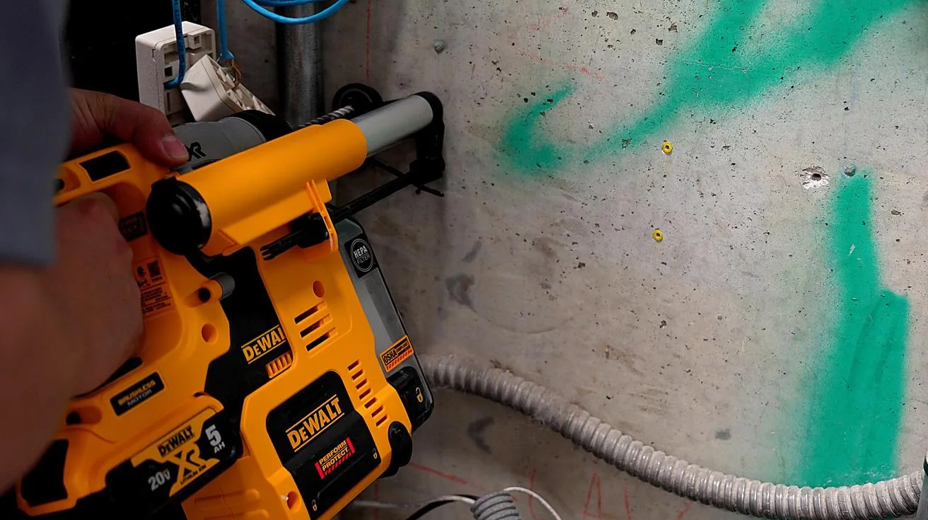 Drilling holes in wall for camera cable runs