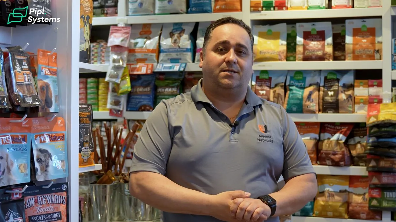 Helder Luis in front of the pet boutique