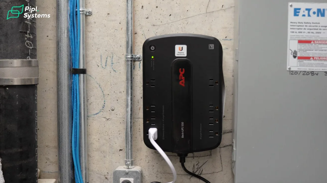 UPS battery backup unit mounted on wall