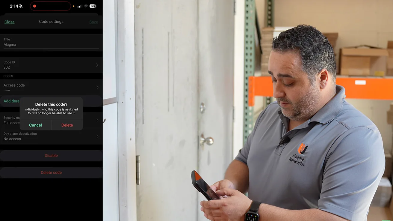 Security technician verifying mobile app user log entries after keypad test