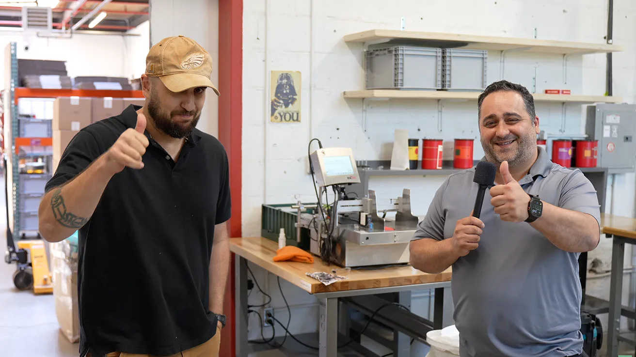Greg from Ethica Coffee and Helder from Magma Networks giving thumbs up after successful installation