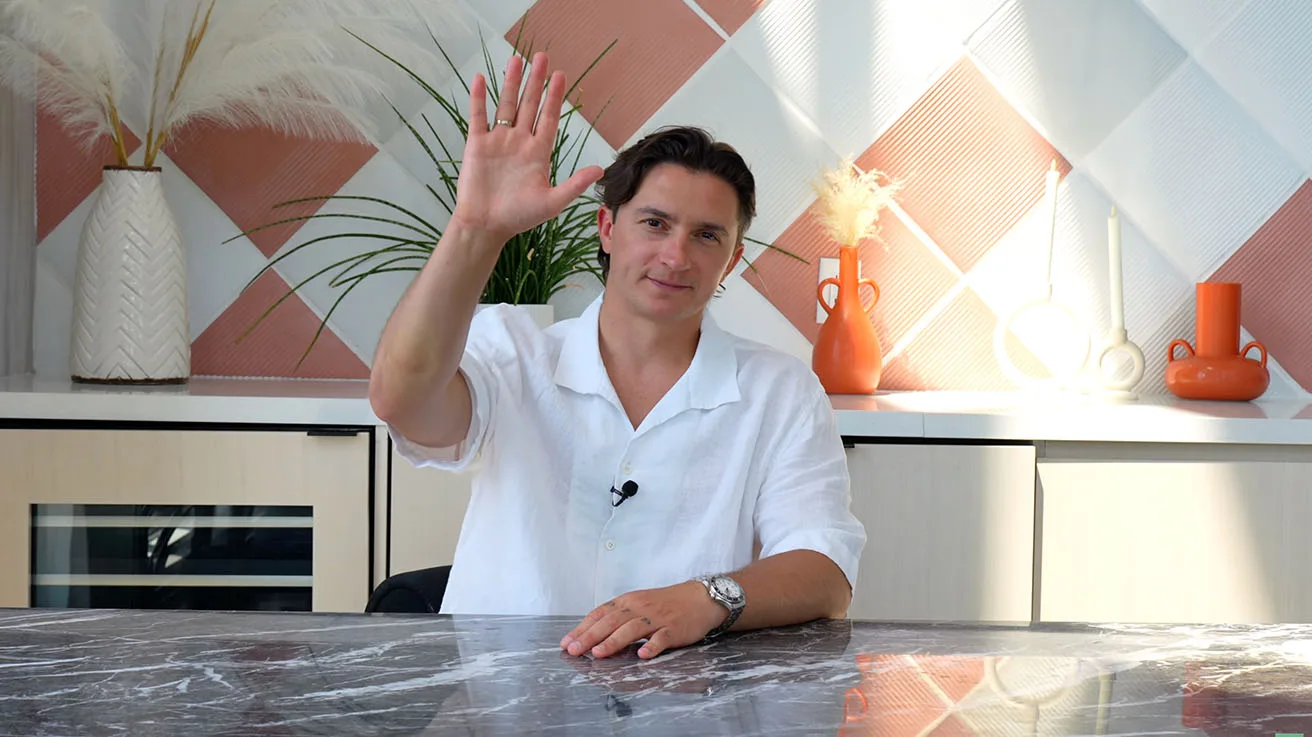 Presenter summarizing final key points comparing NVR and VMS platforms in video studio
