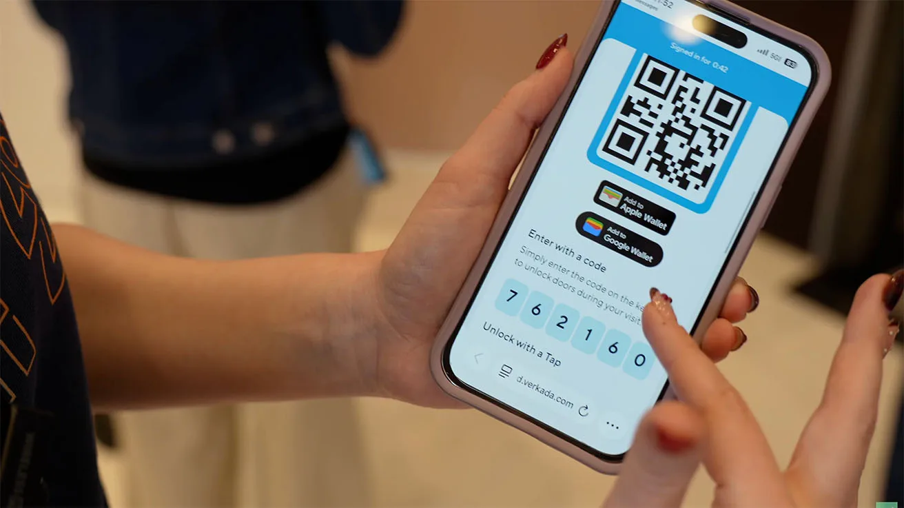 Mobile screen showing a secure QR code and PIN code for multi-factor building access.