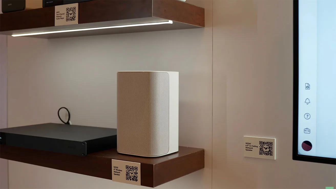 Verkada NS151 wireless network speaker and NP21 two-channel audio player on a display shelf.