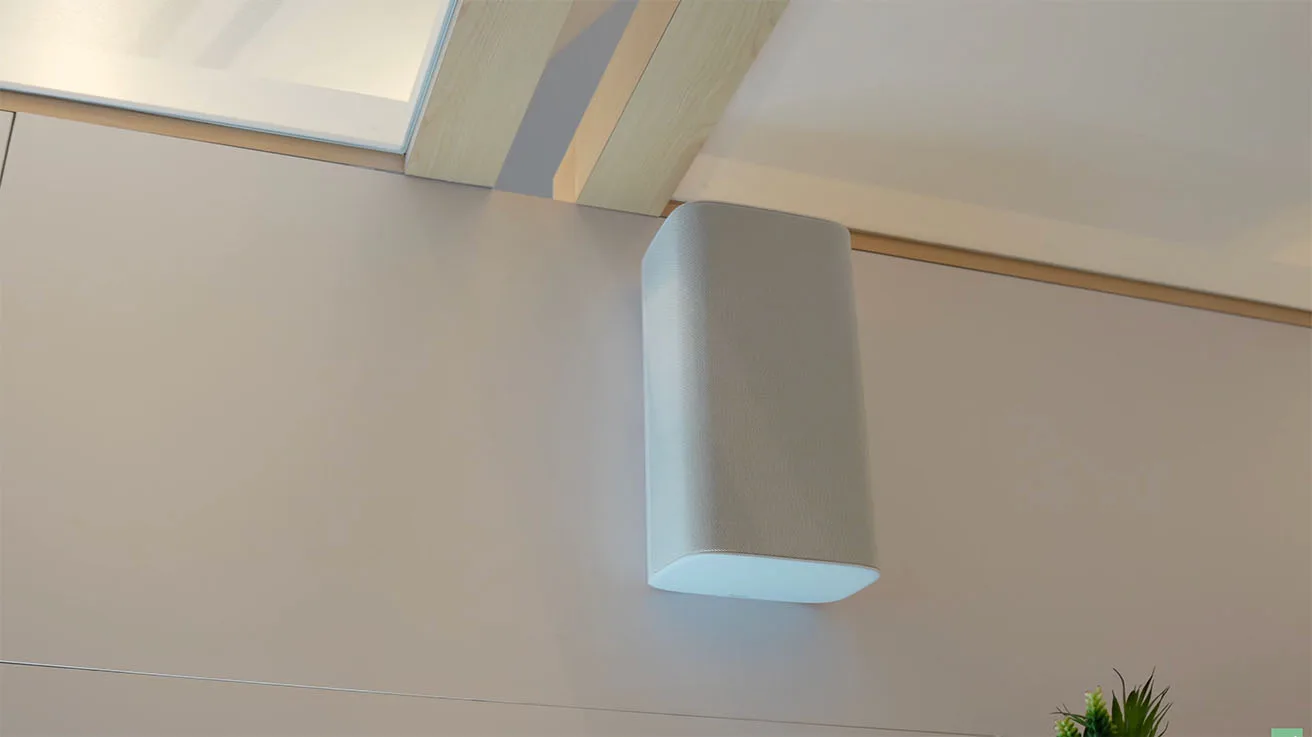Wall-mounted Verkada NS631 surface mount network speaker designed for loud commercial environments.