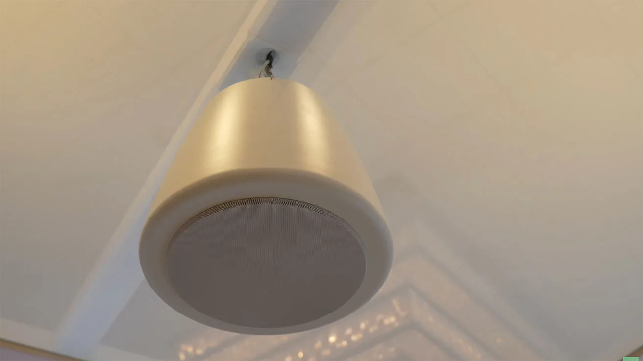 Verkada NS261 in-ceiling network speaker utilizing a pendant mount for drop-ceiling deployments.