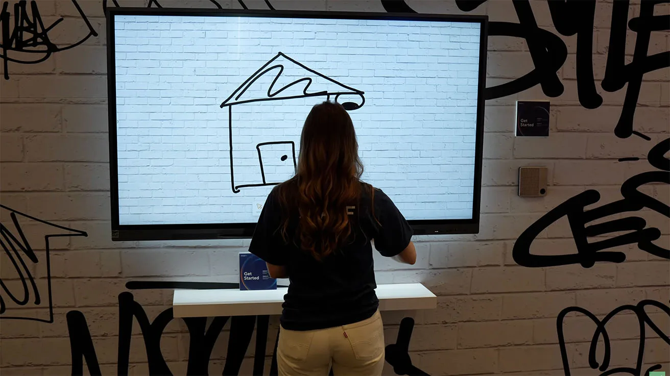 Interactive display demonstrating Verkada active deterrence and live talkdown capabilities for perimeter security.