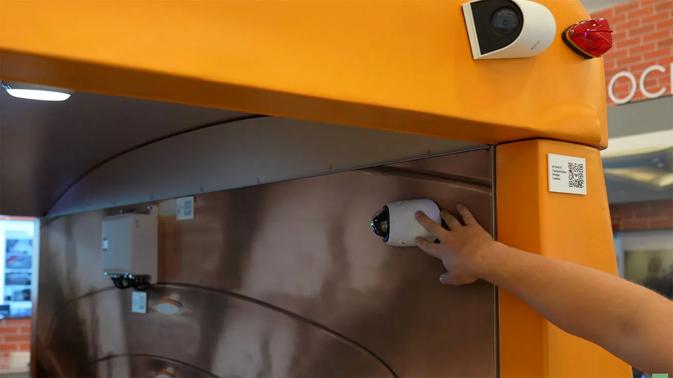 Interior Verkada camera installed within a transit cabin for passenger safety and behavioral analytics.