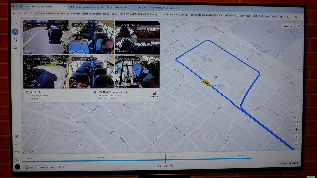 Verkada Transportation dashboard displaying real-time GPS vehicle tracking alongside live multi-camera video feeds.