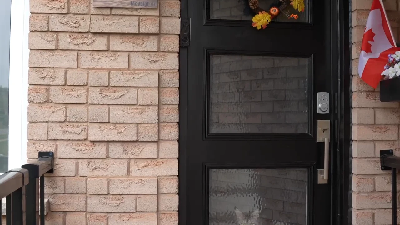 aosu video doorbell already installed beside the home entrance