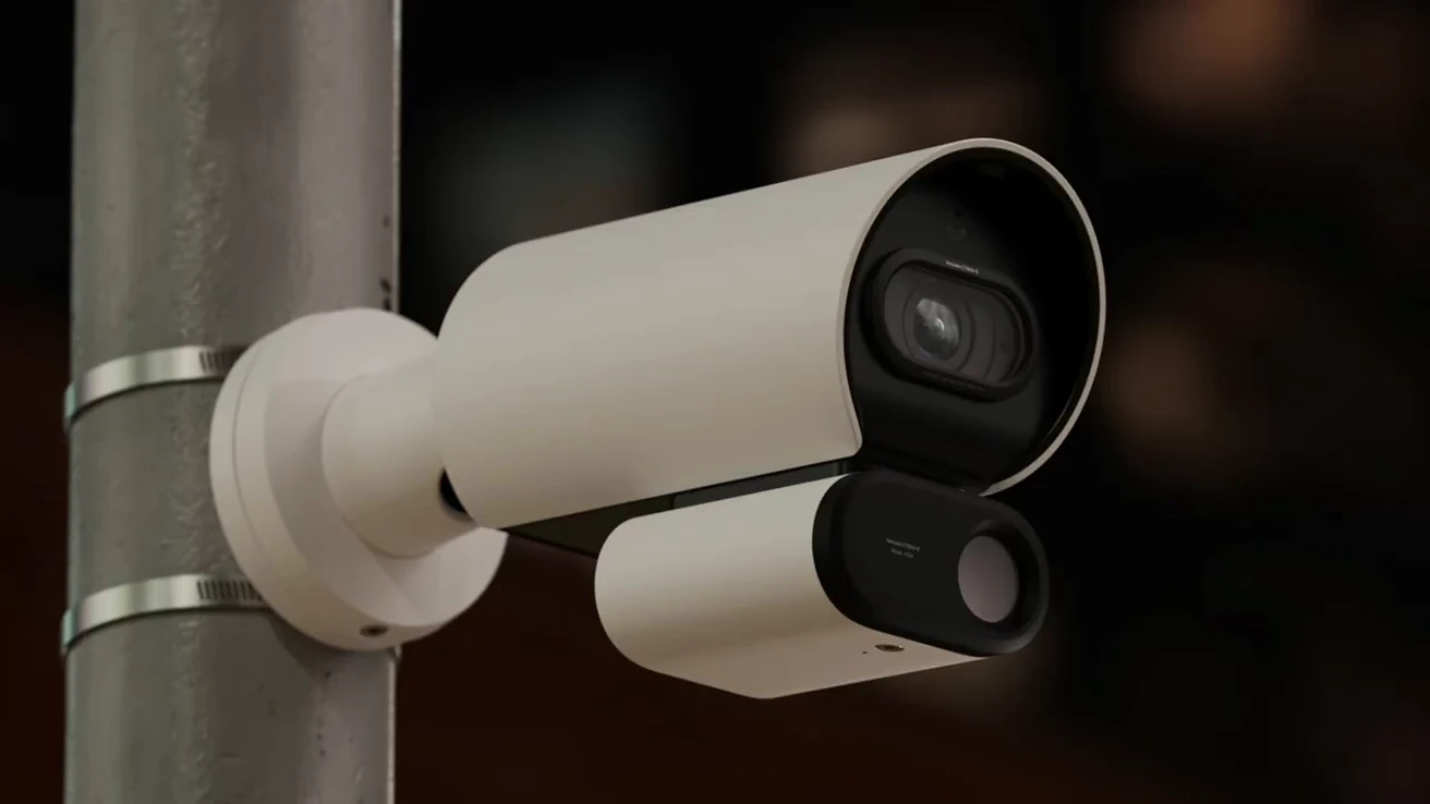 White dual-spectrum camera hardware with separate visible and thermal imaging modules.