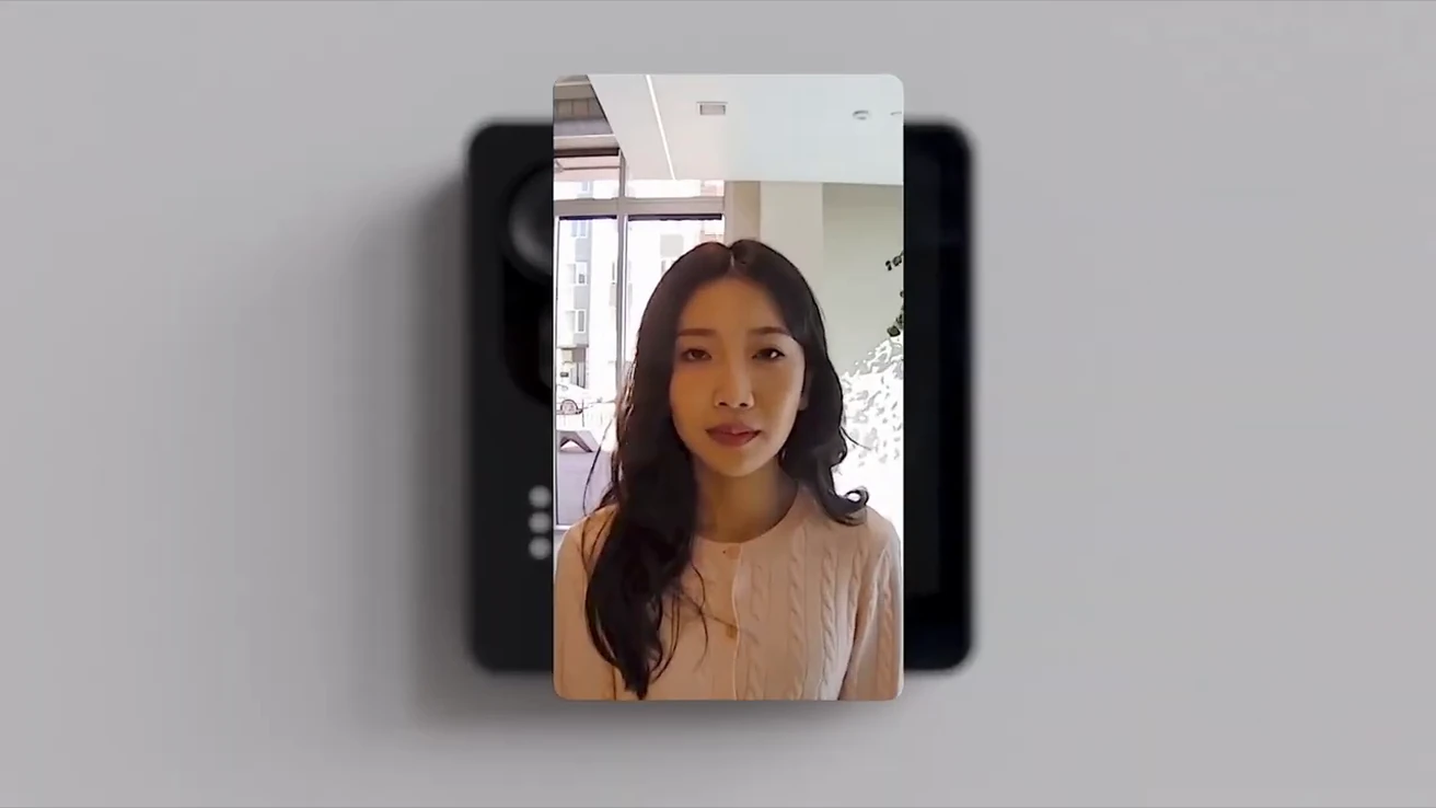 Product demonstration showing a visitor-facing video image on a touchscreen intercom.