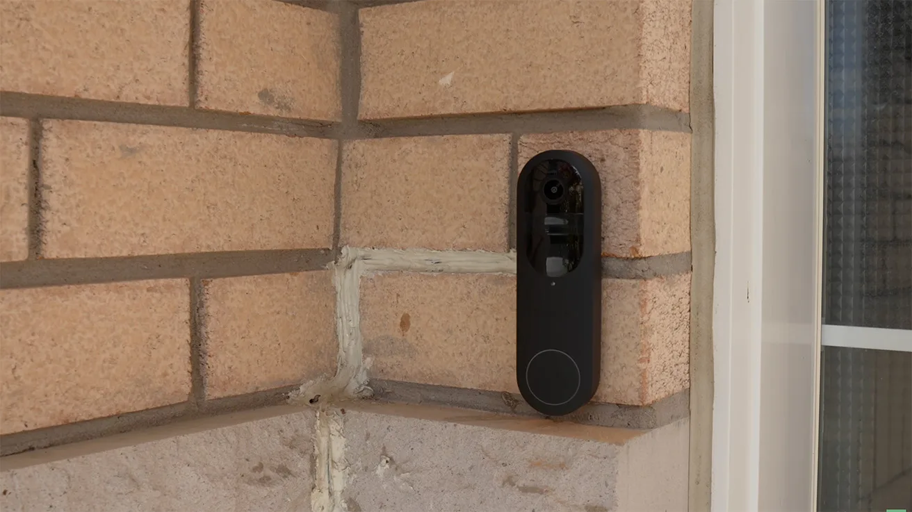 Existing Reolink video doorbell beside the front door